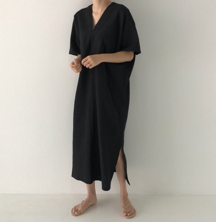 Minimalistyczna, długa, luźna sukienka retro z dekoltem w serek
