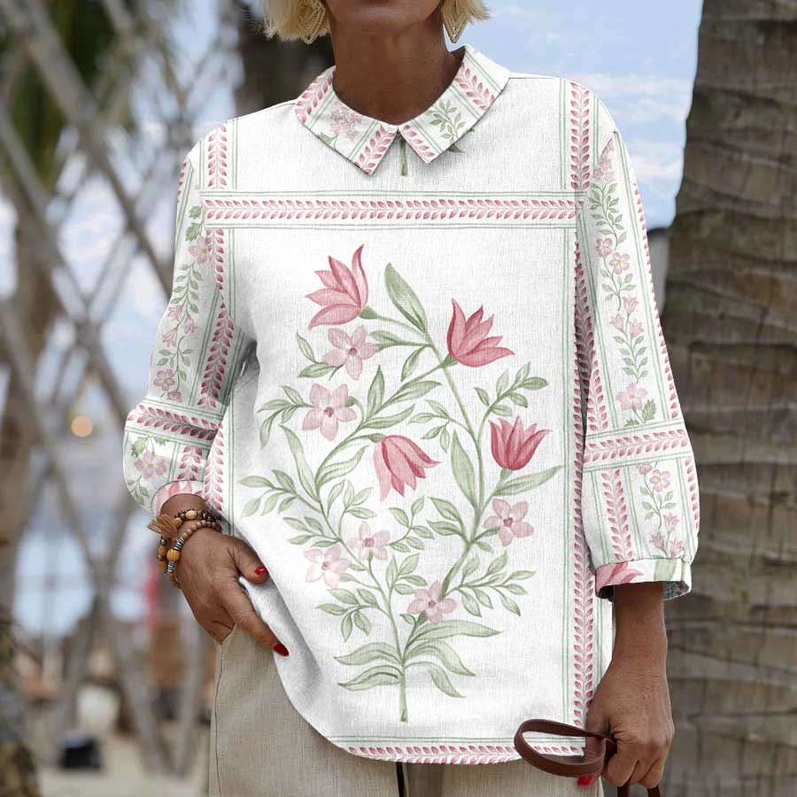 Wygodna biała koszula z długim rękawem wykonana z bawełny i lnu z różowym kwiatowym wzorem