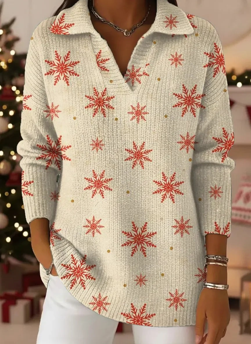 Elegancki i wygodny wełniany sweter w kolorze beżowym, ozdobiony wzorem w kształcie płatków śniegu i wykładanym kołnierzykiem.