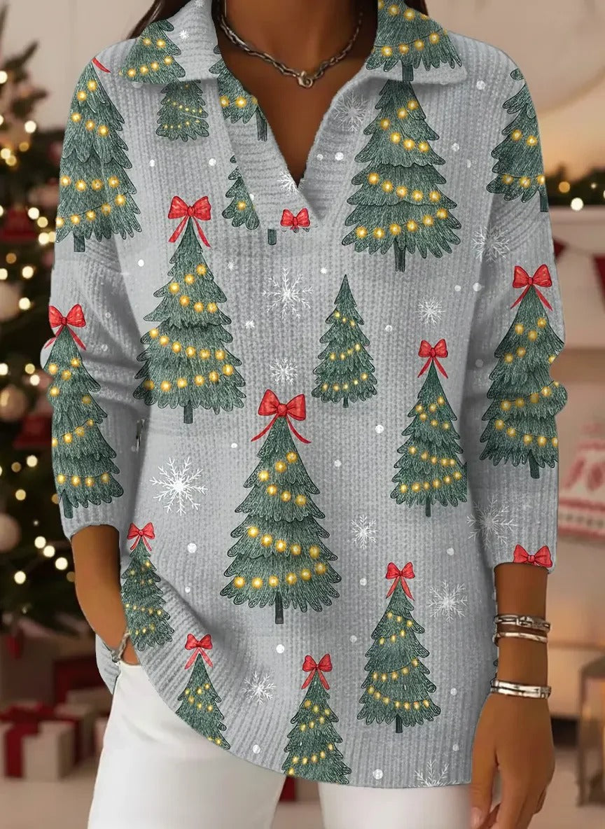 Elegancki i wygodny szary wełniany sweter ze wzorem choinki i wykładanym kołnierzem.