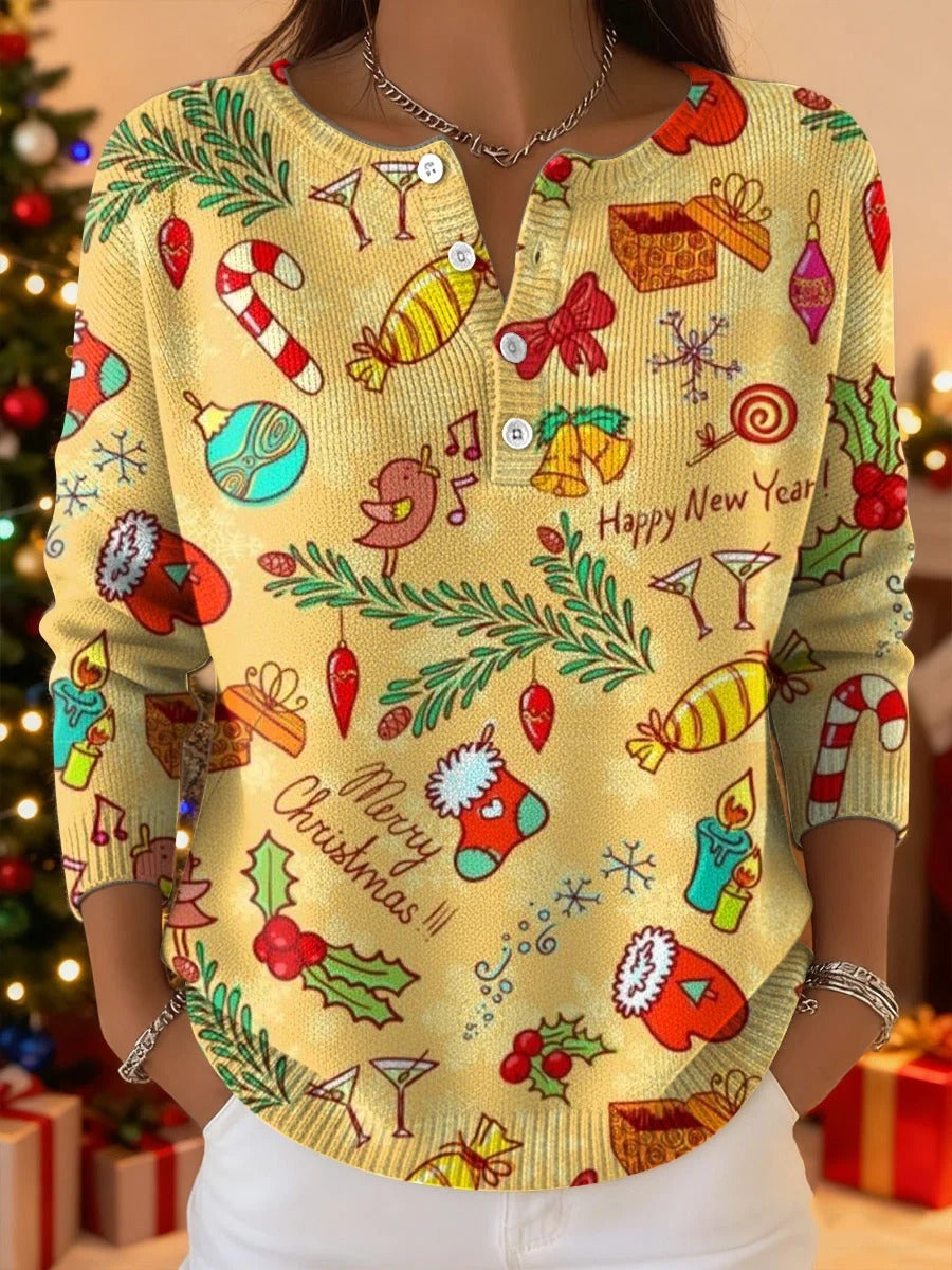 Elegancki i wygodny żółty sweterek, ozdobiony ładnym nadrukiem przedstawiającym świąteczne prezenty, z półotwartym dekoltem.