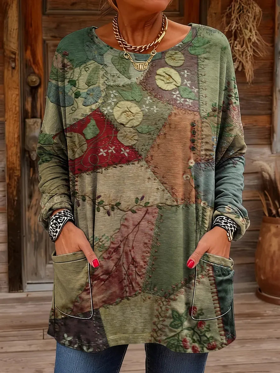 Elegancki i wygodny sweter kaszmirowy o nieregularnym wzorze, z okrągłym dekoltem i kieszeniami.