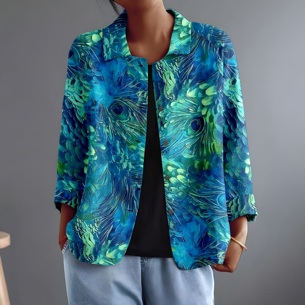 Wygodna i swobodna turkusowa koszula z piórami pawia zapinana na guziki