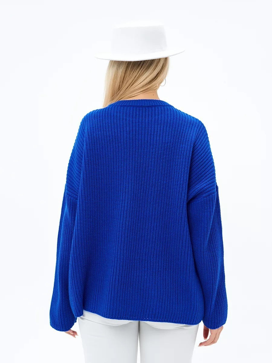 Elegancki i wygodny sweter z okrągłym dekoltem w jednolitym kolorze, miękki w dotyku