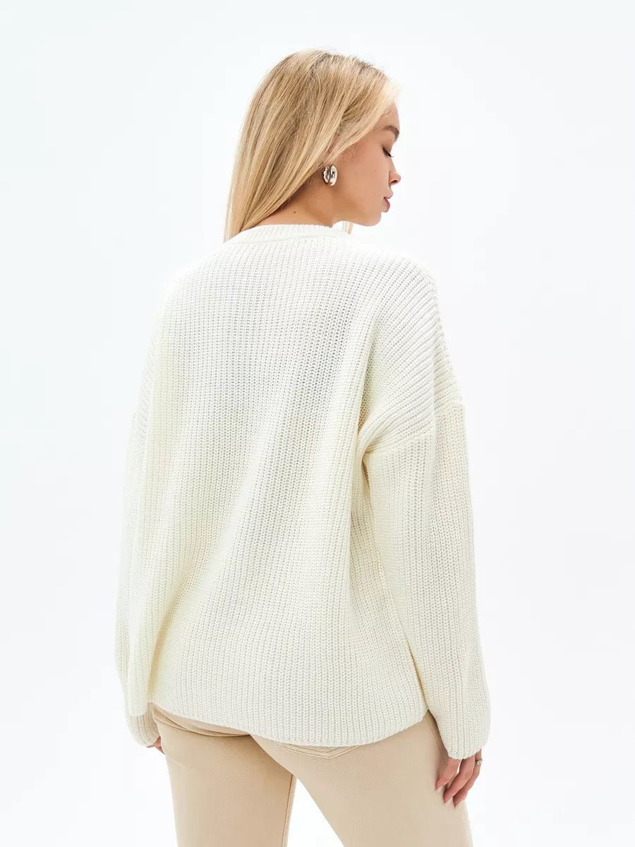 Elegancki i wygodny sweter z okrągłym dekoltem w jednolitym kolorze, miękki w dotyku