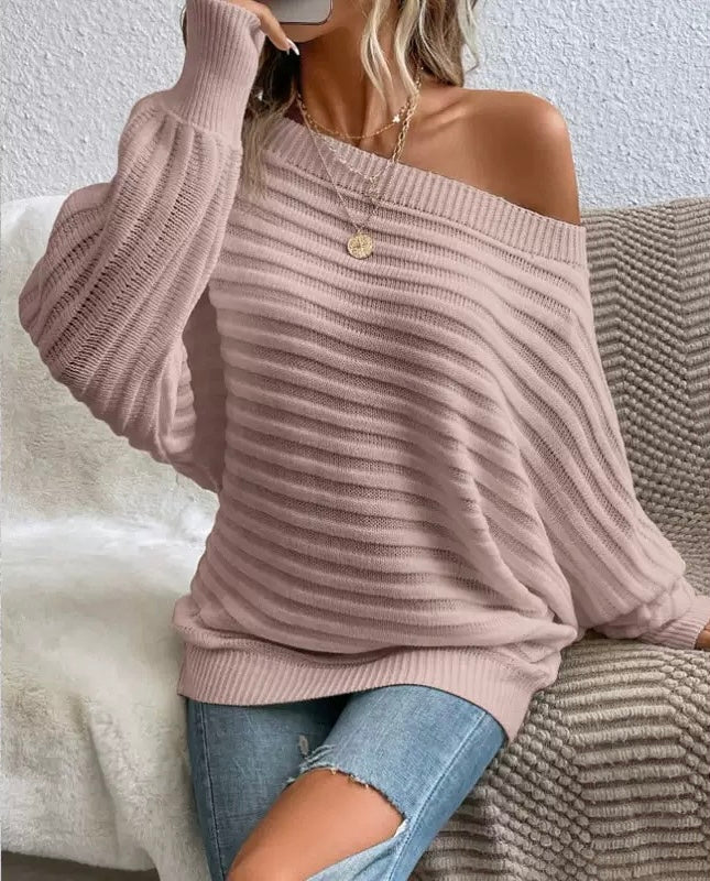 Elegancki i wygodny sweter z skośnym dekoltem i rękawami typu nietoperz