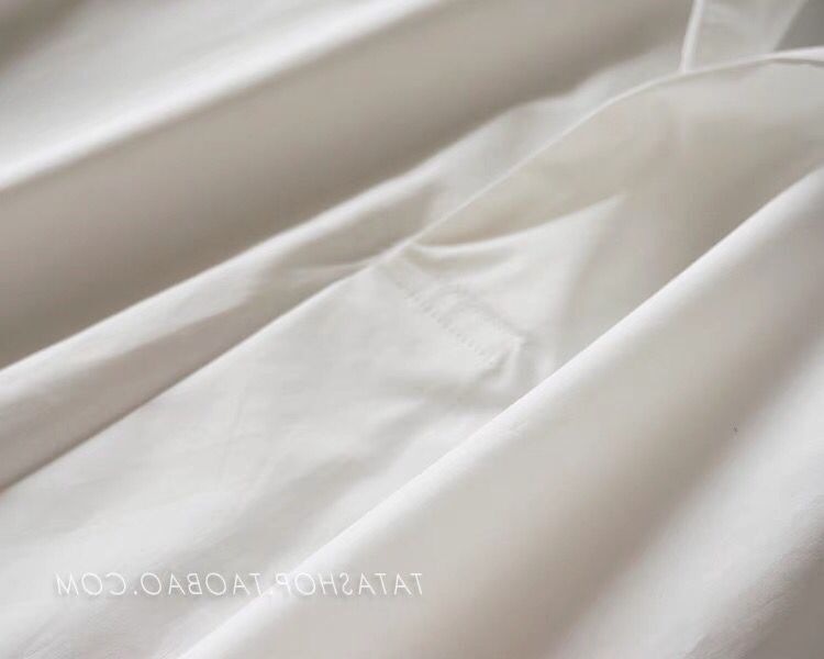 Elegancka i wygodna biała koszula z krótkim rękawem