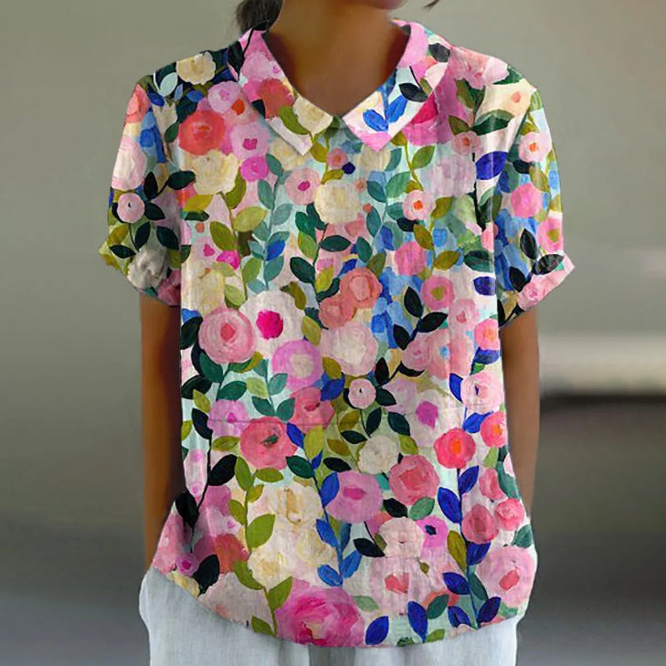 Damska koszula z uroczymi klapami i wzorem w rośliny