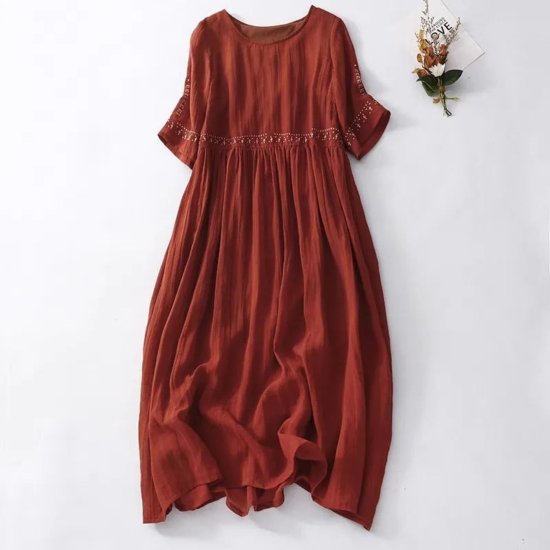 Elegancka bawełniana sukienka w stylu vintage z okrągłym dekoltem 02