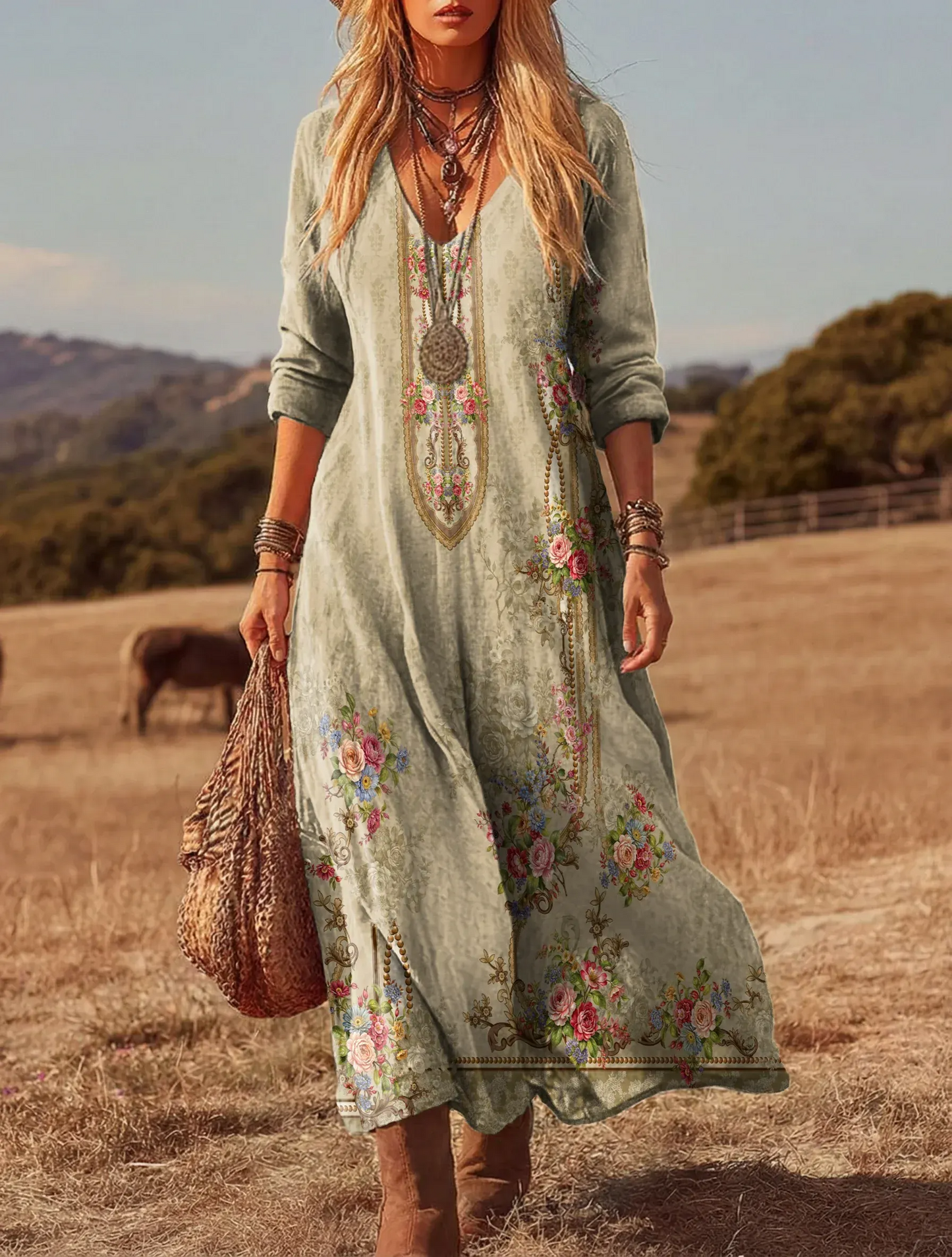 Ta elegancka i wygodna, jasnozielona sukienka z bawełny i lnu wyróżnia się pięknym kwiatowym nadrukiem, rękawami o długości 3/4 i szeroką spódnicą.