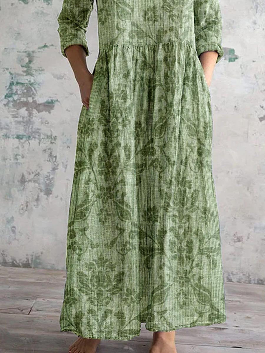 Szykowna, elegancka sukienka midi z dekoltem w kształcie litery V, rękawem trzy czwarte i nadrukiem w stylu vintage