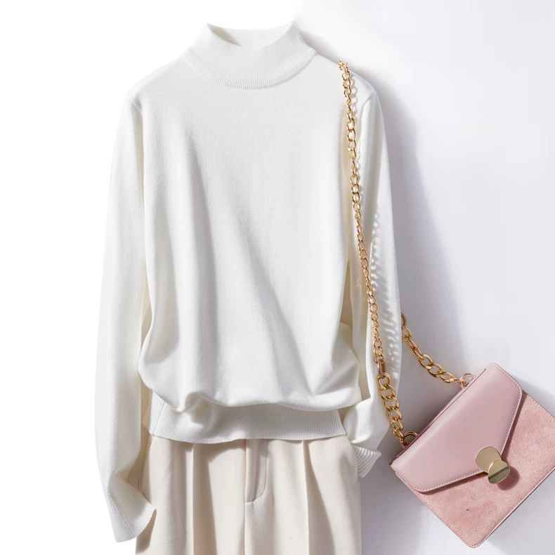 Elegancki i wygodny golf w jednolitym kolorze; uniwersalny styl.