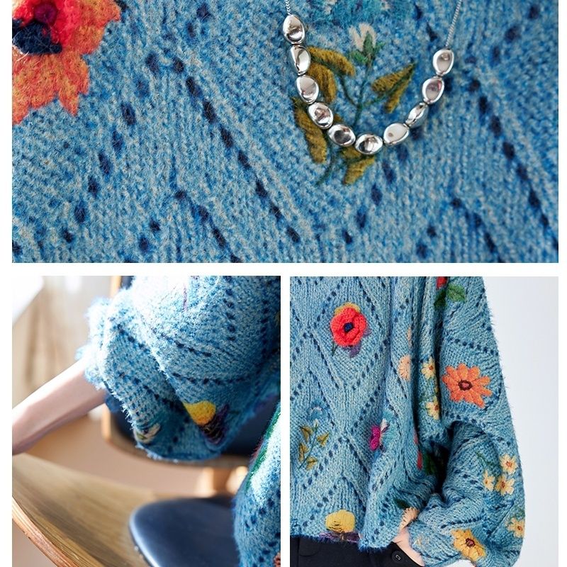 Elegancki i wygodny, dzianinowy sweter w kolorze niebieskim, z okrągłym dekoltem, ażurowym wzorem i kwiatowymi zdobieniami.