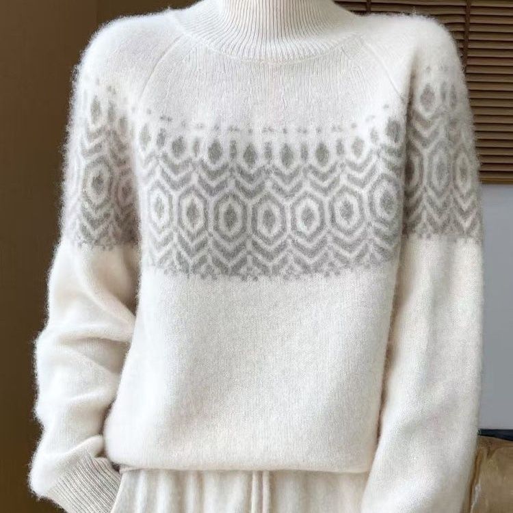 Elegancki i wygodny sweter z golfem, miękki i ciepły, z geometrycznym wzorem żakardowym.