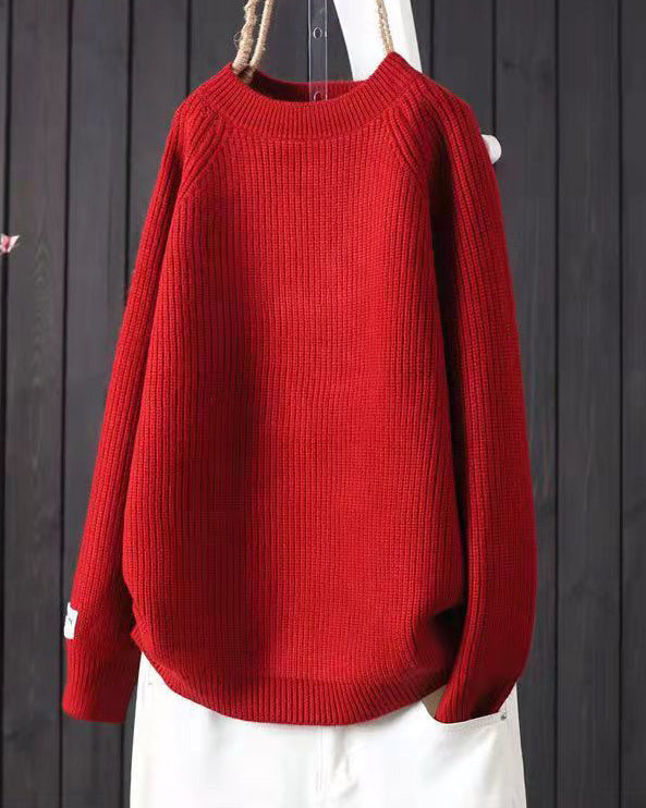 Elegancki i wygodny sweter w jednolitym kolorze z okrągłym dekoltem, uniwersalny fason.