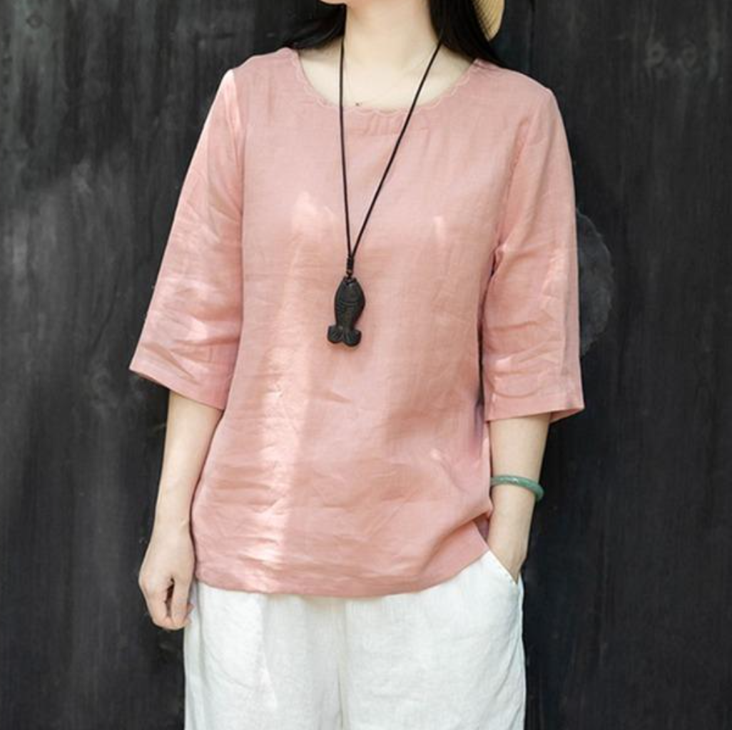 Elegancka, luźna i wygodna koszula z krótkim rękawem i okrągłym dekoltem w jednolitym kolorze