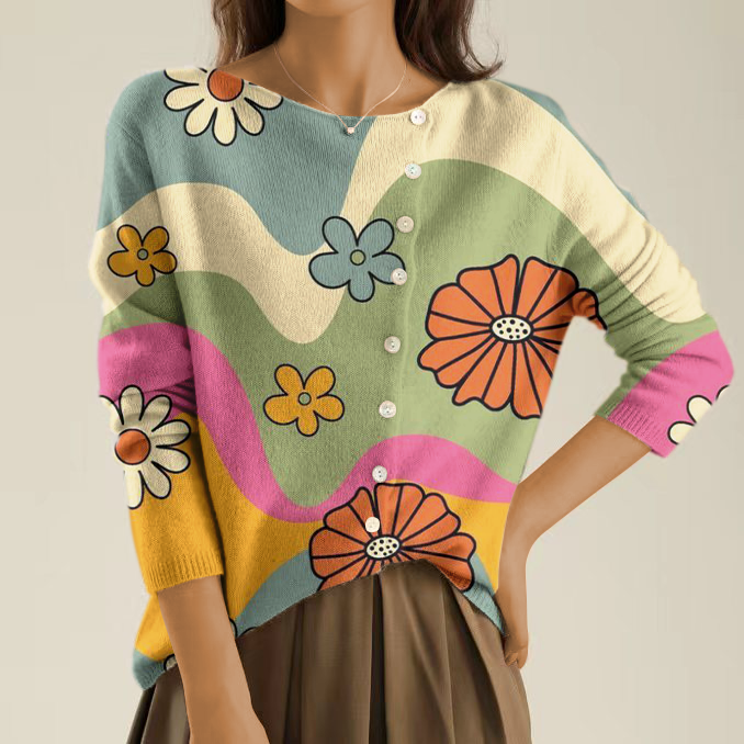 Elegancki i wygodny sweterek z kwiatowym wzorem i nieregularnymi guzikami