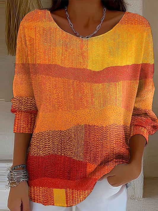 Elegancki i wygodny sweter z długim rękawem i okrągłym dekoltem w kolorze pomarańczowym.