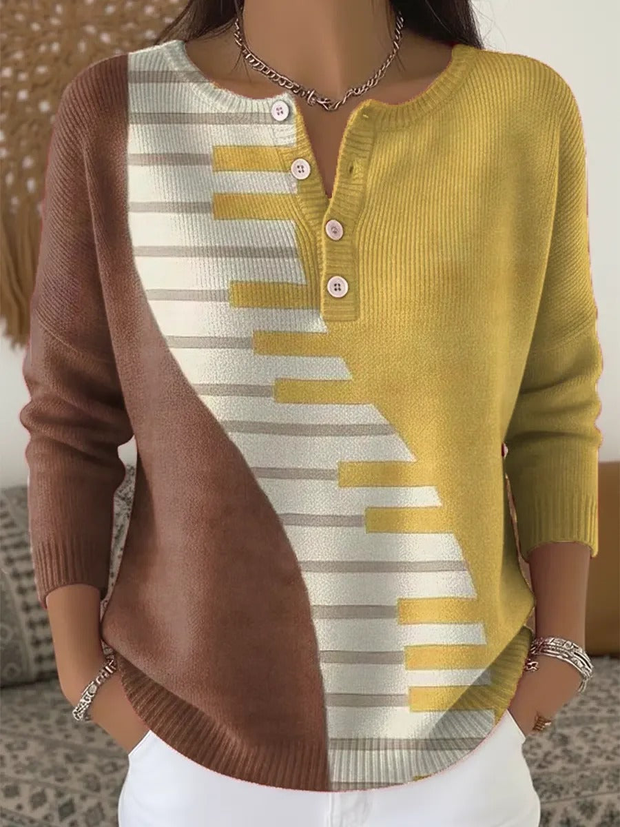 Elegancki i wygodny sweter w żółto-brązowe bloki kolorystyczne z półotwartym dekoltem.