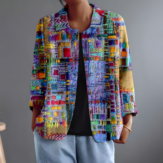 Elegancka i wygodna koszula z długim rękawem z wielokolorowymi, geometrycznymi blokami, uniwersalna i stylowa.