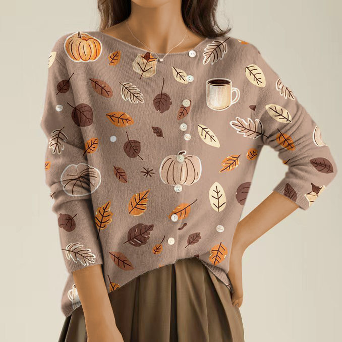 Elegancki i wygodny sweter w kolorze khaki, ozdobiony prostym, ale pięknym nadrukiem i nieregularnymi guzikami.