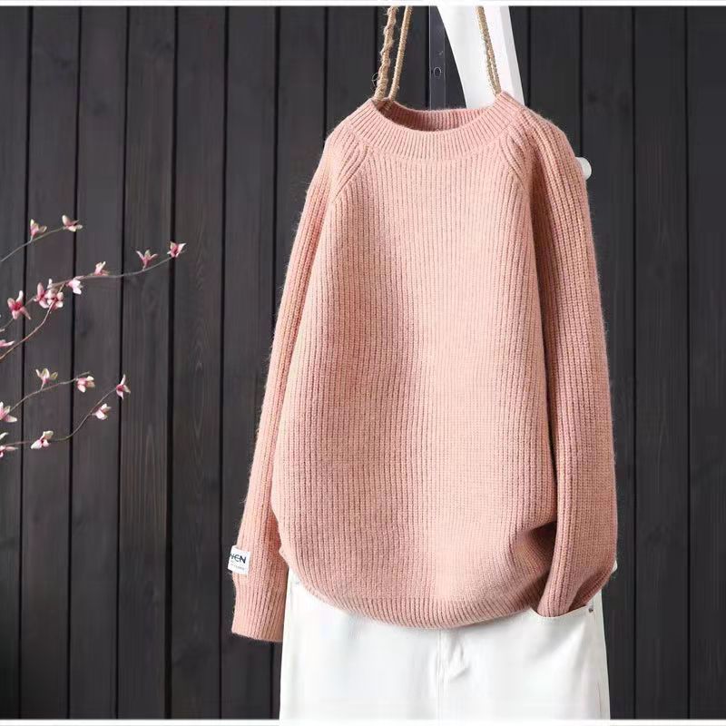 Elegancki i wygodny sweter w jednolitym kolorze z okrągłym dekoltem, uniwersalny fason.