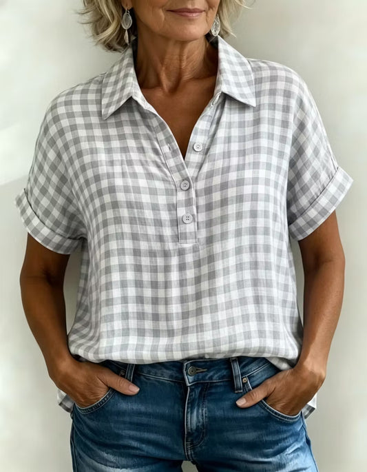 Zupełnie nowy, letni damski top w kratę, pełen artystycznego polotu i eleganckiego stylu.