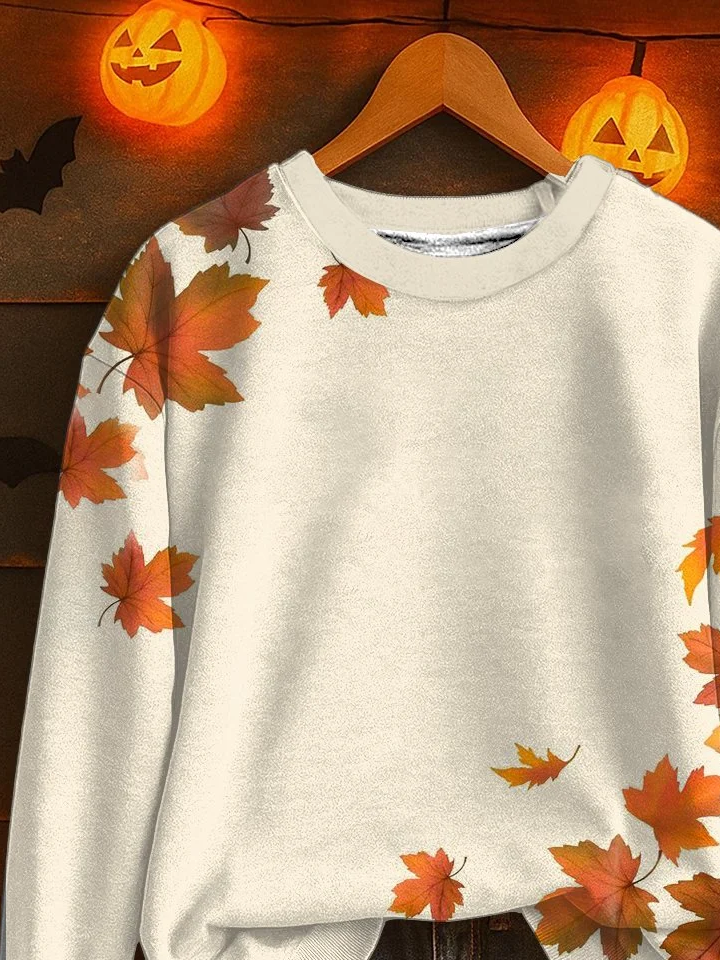 Klasyczna i wygodna bluza z pięknym wzorem pomarańczowego liścia klonu