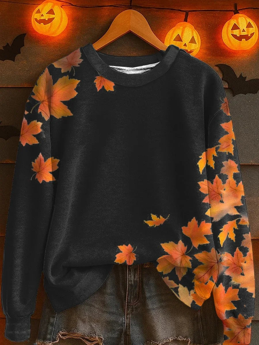 Klasyczna i wygodna bluza z pięknym wzorem pomarańczowego liścia klonu