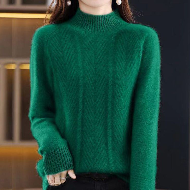 Elegancki i wygodny golf w jednolitym kolorze, ozdobiony tkanym, skręconym wzorem.