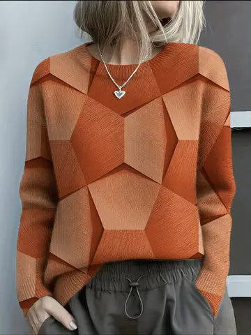 Elegancki i wygodny sweter z okrągłym dekoltem, ozdobiony kolorowymi, nieregularnymi wzorami geometrycznymi; uniwersalny styl.