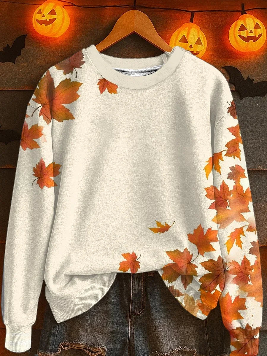 Klasyczna i wygodna bluza z pięknym wzorem pomarańczowego liścia klonu