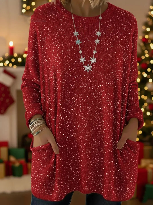 Elegancki i wygodny sweter z kaszmiru w jednolitym kolorze, z okrągłym dekoltem, ozdobiony połyskującym wzorem w gwiazdy i wyposażony w kieszenie.