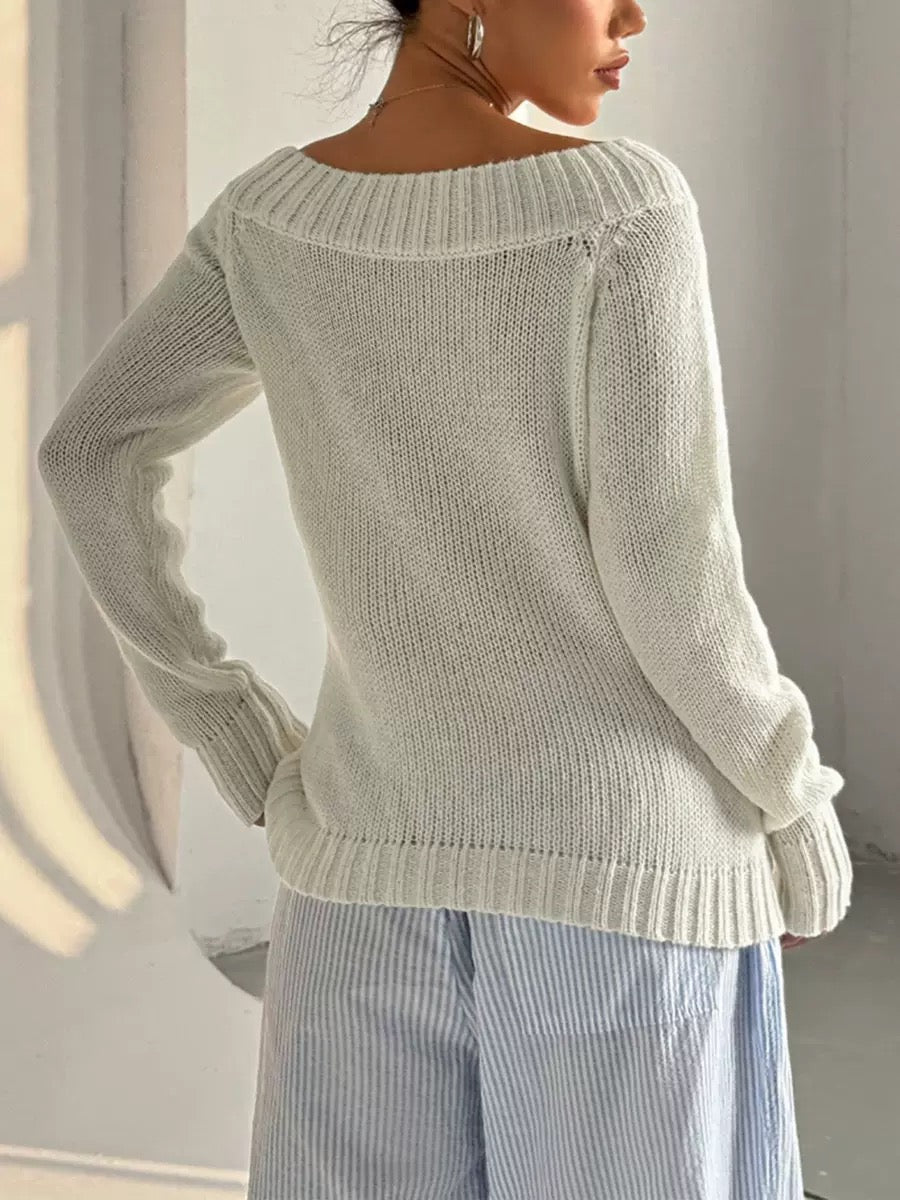 Elegancki i wygodny sweter z okrągłym dekoltem, który można nosić na wiele sposobów