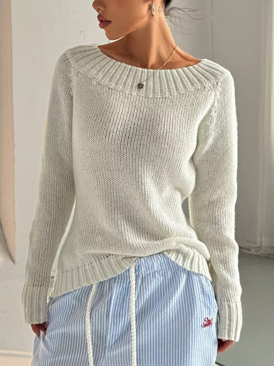Elegancki i wygodny sweter z okrągłym dekoltem, który można nosić na wiele sposobów