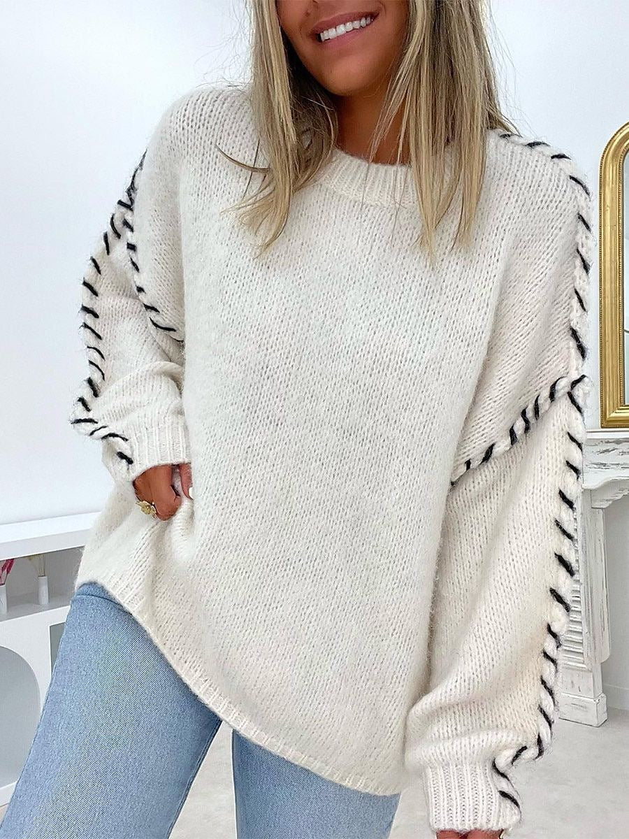 Elegancki i wygodny sweter w jednolitym kolorze z okrągłym dekoltem i teksturowanymi, tkanymi rękawami