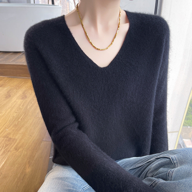 Elegancki i wygodny sweter w jednolitym kolorze z dekoltem w serek, miękki w dotyku, tkany ręcznie; ciepły i wygodny.