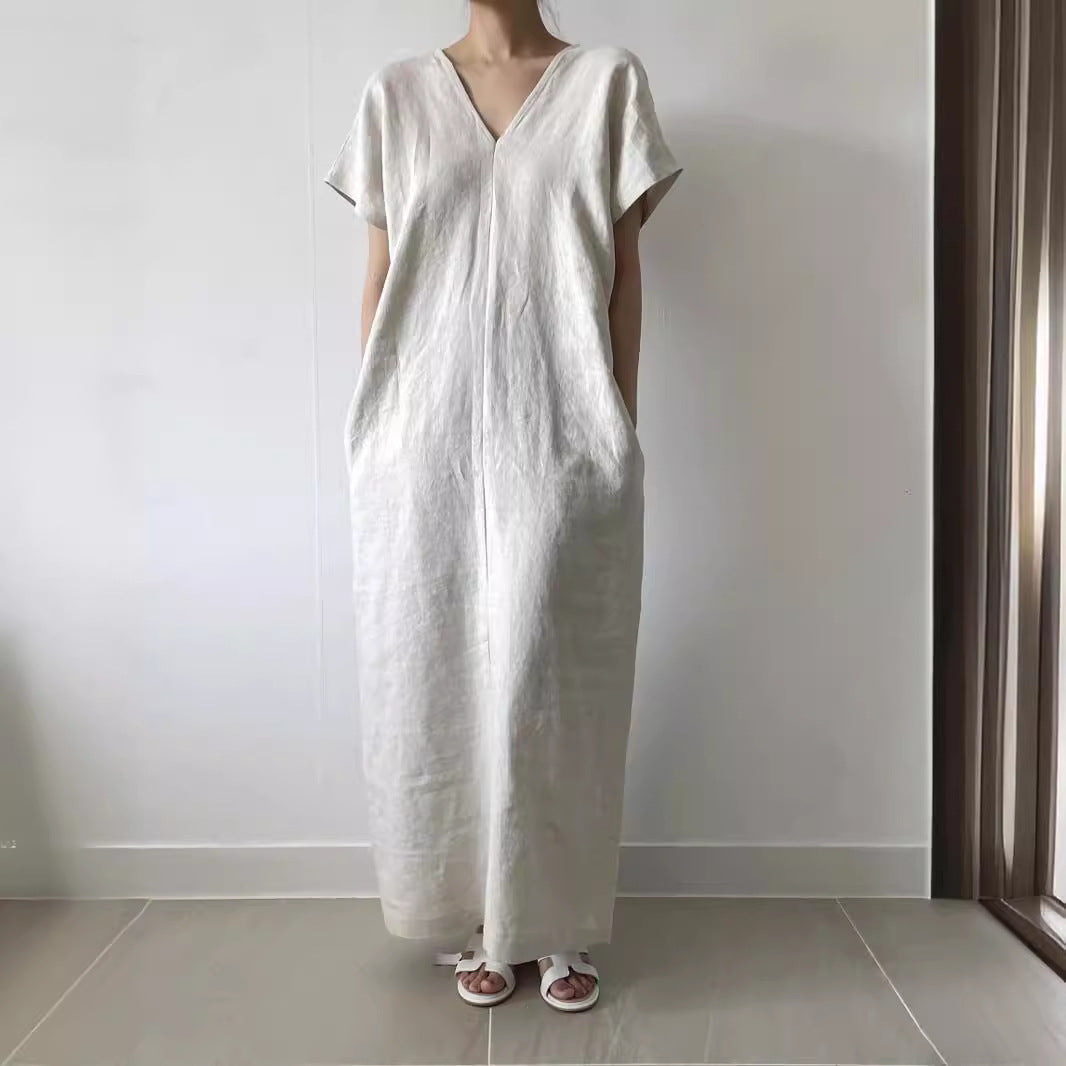 Minimalistyczna, długa, luźna sukienka retro z dekoltem w serek