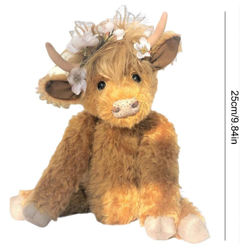 Urocza lalka towarzyszka rasy Highland Cow