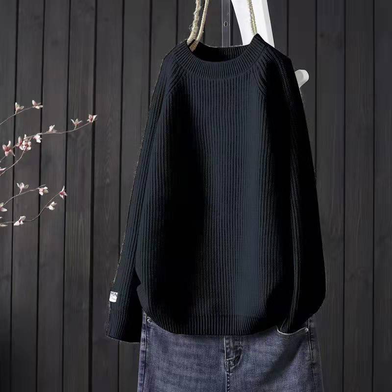 Elegancki i wygodny sweter w jednolitym kolorze z okrągłym dekoltem, uniwersalny fason.
