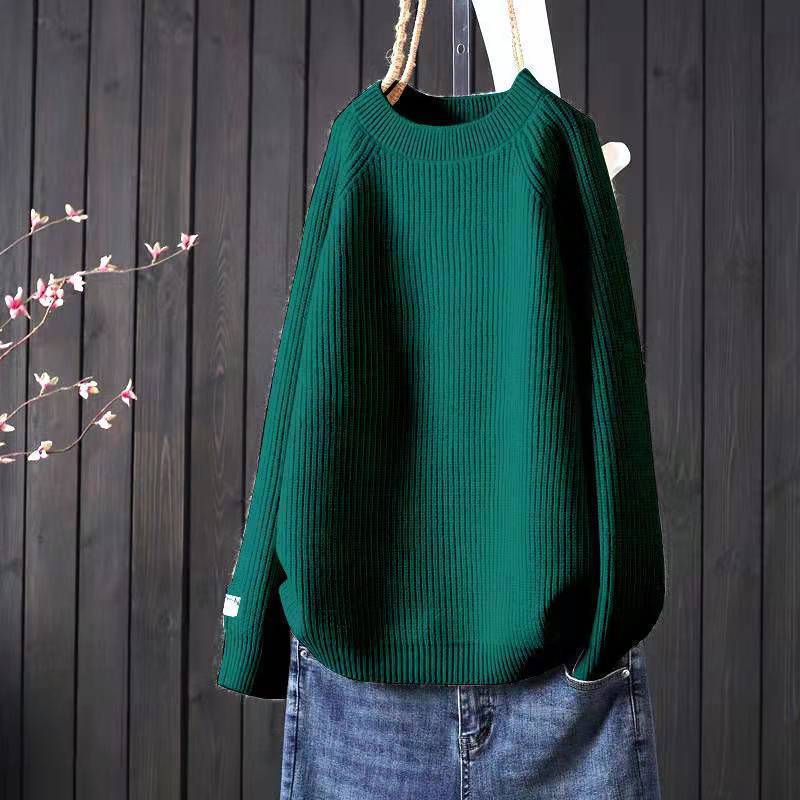 Elegancki i wygodny sweter w jednolitym kolorze z okrągłym dekoltem, uniwersalny fason.