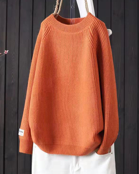 Elegancki i wygodny sweter w jednolitym kolorze z okrągłym dekoltem, uniwersalny fason.