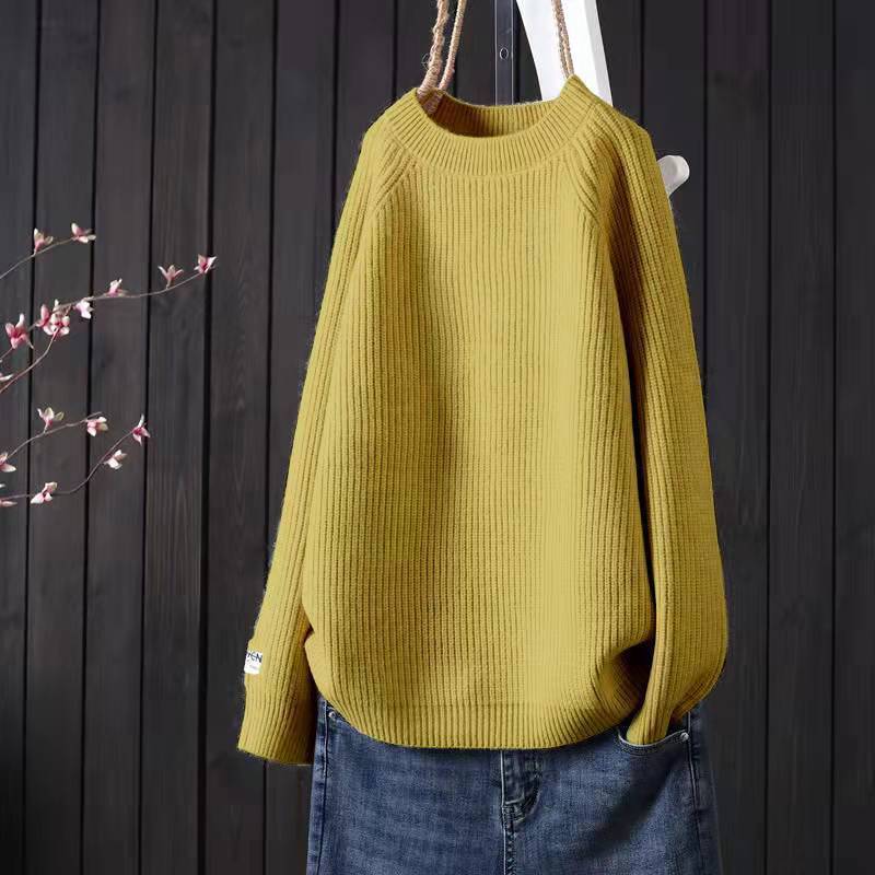 Elegancki i wygodny sweter w jednolitym kolorze z okrągłym dekoltem, uniwersalny fason.