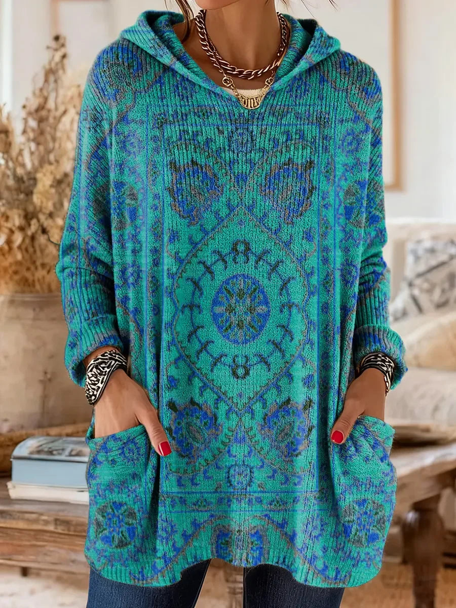 Elegancki i wygodny sweter kaszmirowy z nadrukiem w kwiaty w stylu boho, z kapturem i kieszeniami.