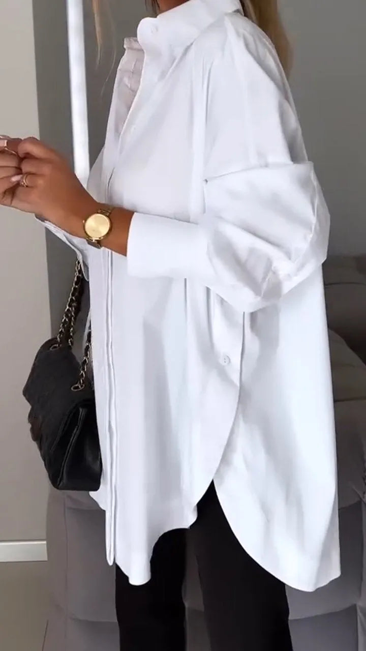 Ta prosta, luźna koszula o eleganckim wyglądzie jest dostępna w różnych kolorach. Ma długie rękawy, jednolity kolor i nadaje się do noszenia na co dzień.