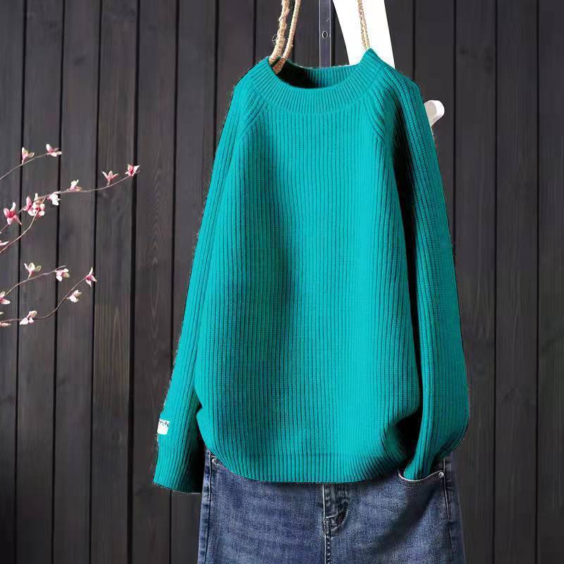 Elegancki i wygodny sweter w jednolitym kolorze z okrągłym dekoltem, uniwersalny fason.