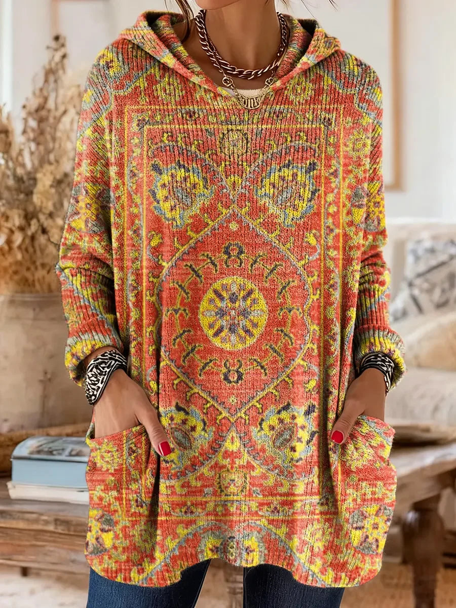 Elegancki i wygodny sweter kaszmirowy z nadrukiem w kwiaty w stylu boho, z kapturem i kieszeniami.