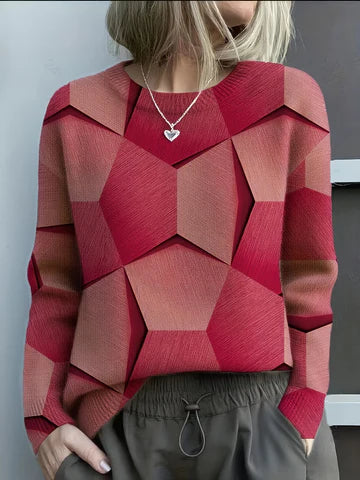 Elegancki i wygodny sweter z okrągłym dekoltem, ozdobiony kolorowymi, nieregularnymi wzorami geometrycznymi; uniwersalny styl.