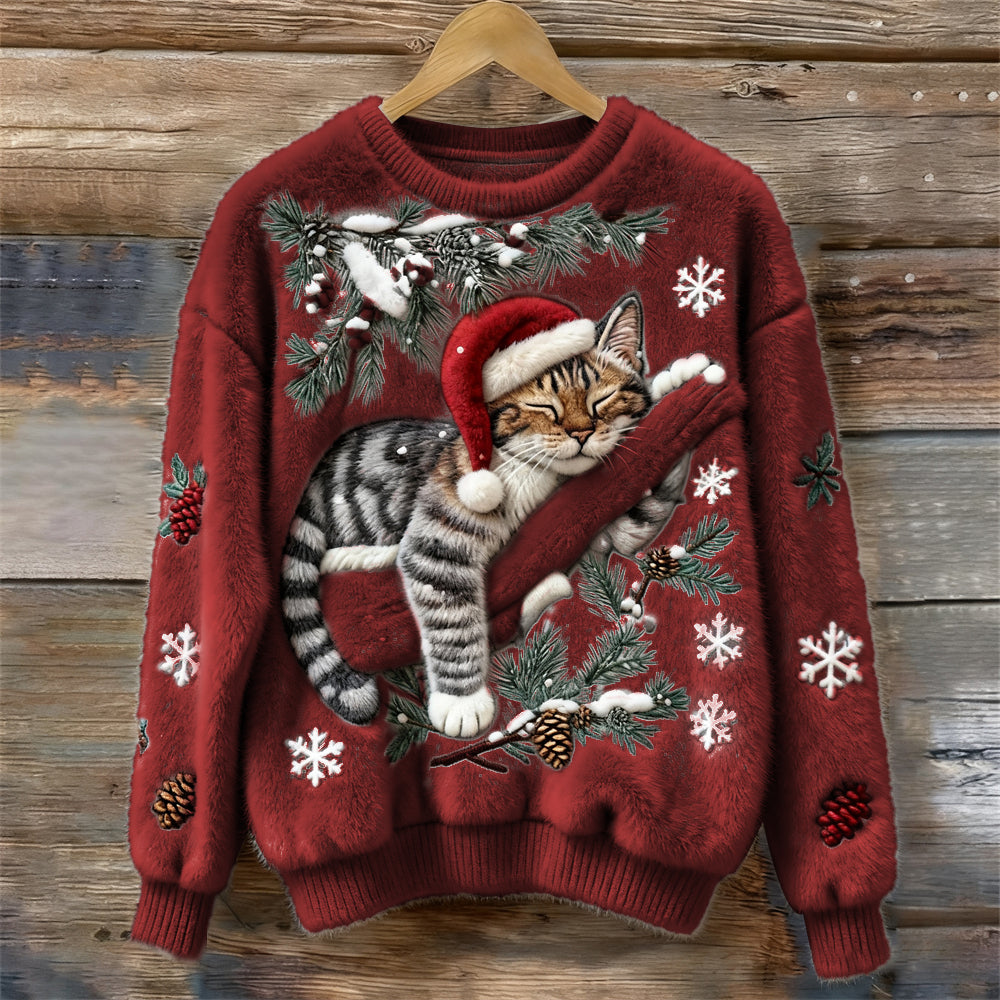 Elegancki i wygodny wełniany top z okrągłym dekoltem ozdobiony uroczym motywem kota, jednocześnie ciepły i stylowy.