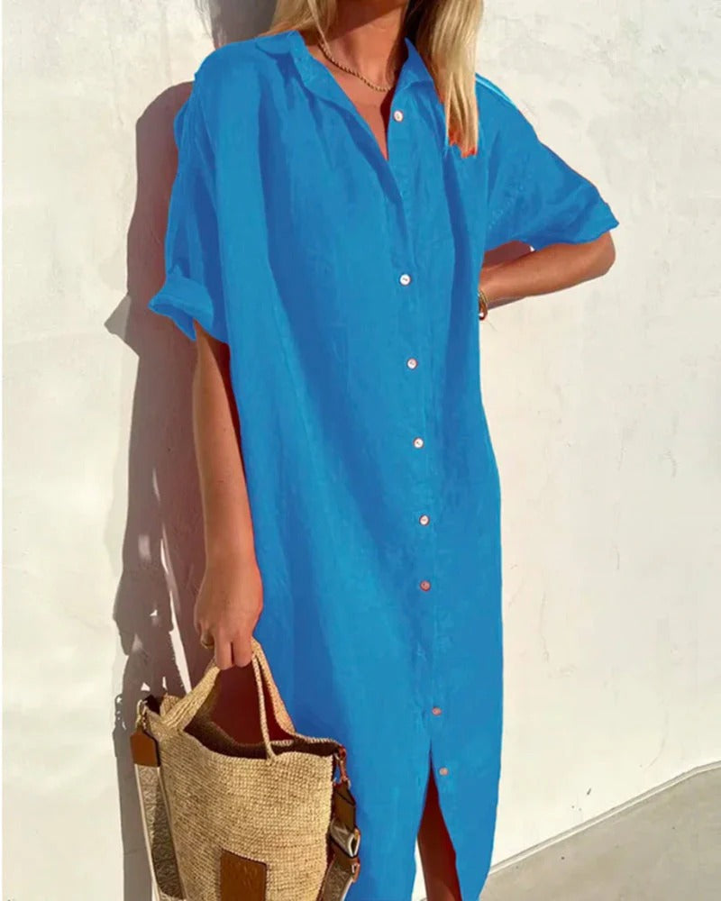 Elegancka, swobodna, luźna sukienka z krótkim rękawem, zapinana na guziki, długa, wykonana z bawełny i lnu, z kieszeniami.